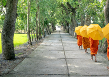 Monks walking by foot